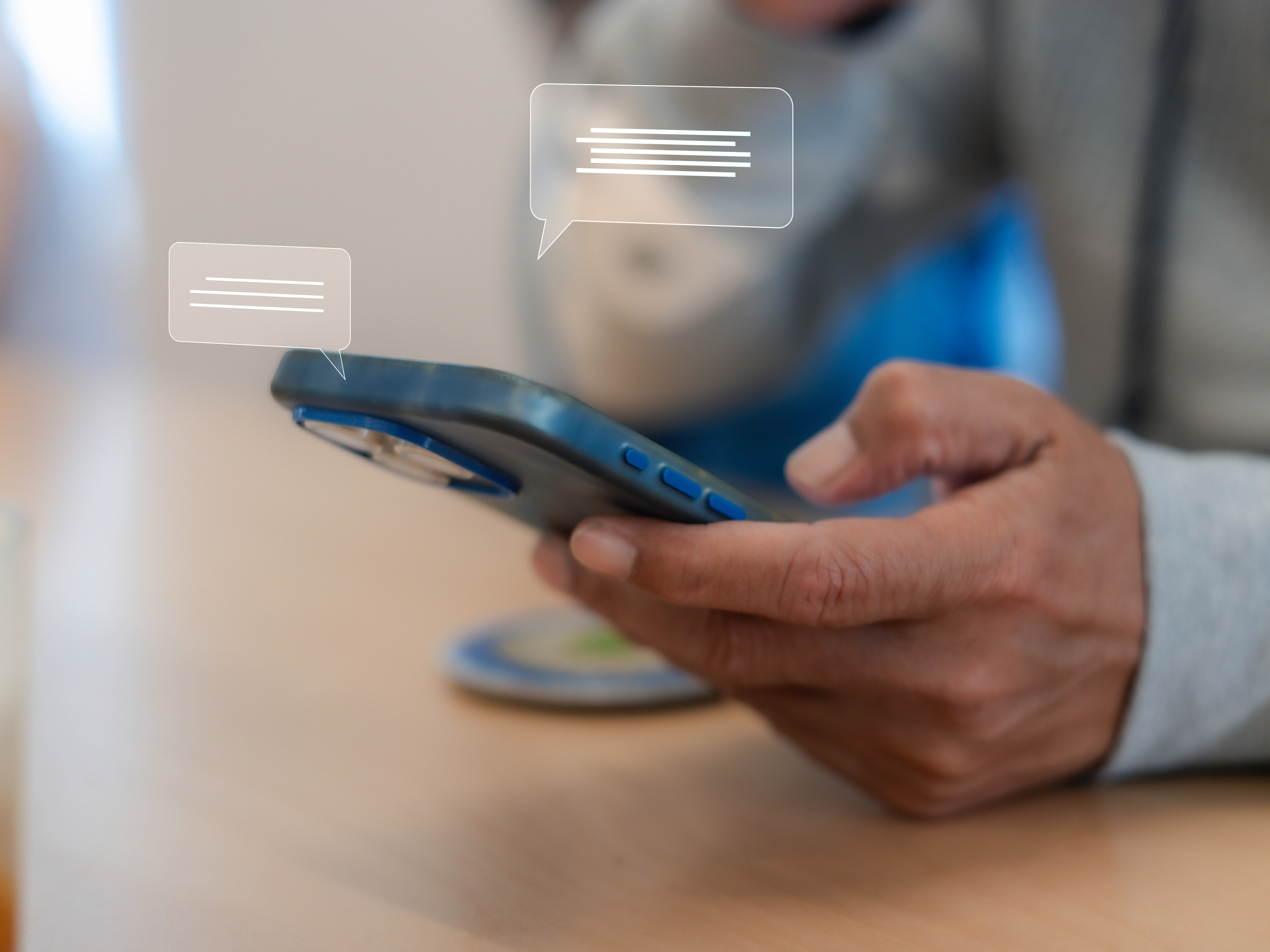 Close up man using smart phone, Social media marketing concept. hand using smartphone typing, chatting conversation in chat box icons pop up